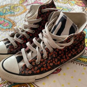 Converse Chuck Taylor floral high tops with zebra print tongue. Womens 7.5